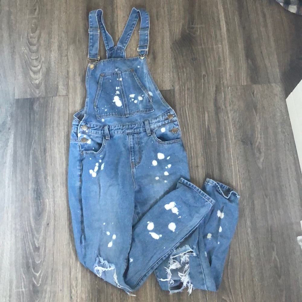 navy overalls with white splatter paint
